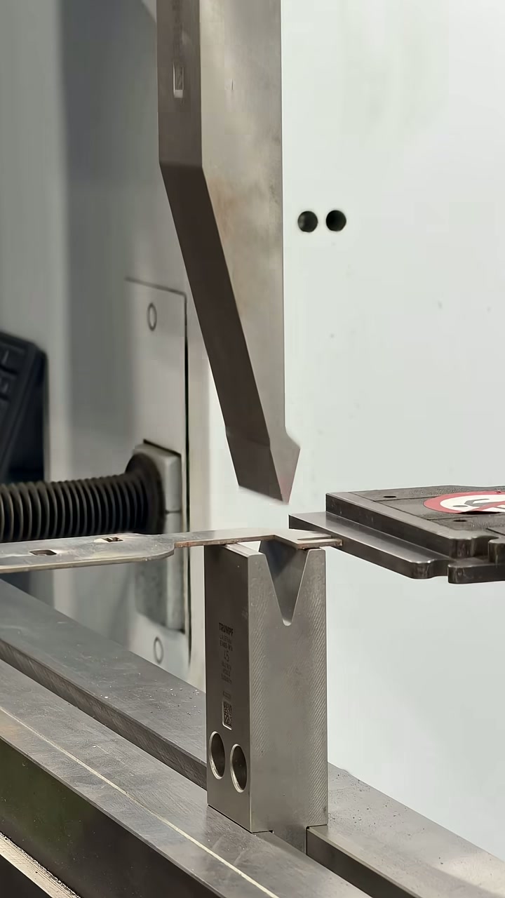 Press brake tooling forming a metal part